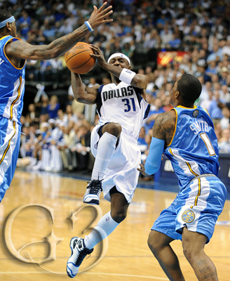 Jason Terry Jason 'the Jet' Terry goes up for a layup through the Denver defense.