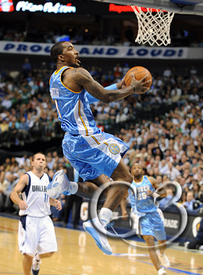 6 Denver's J.R. Smith takes a fast break in for a reverse dunk